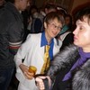 Е. Коновалова (критик, в белом костюме)